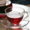 glass tea cup and saucer