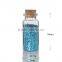 Corked Glass Packaging Bottles Filled With Blue Cosmetic Powder Glitters