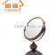 Green bronze magnifying antique table mirror