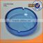 different sizes blue round glass ashtray