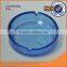 different sizes blue round glass ashtray