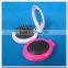 Compact foldable hair brush with mirror
