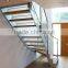 bespoke interior steel L shape stairs with teak steps glass railings