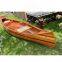 Wooden cedar canoe fishing kayak rowing boat with paddle