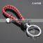 Hot Sale Manual Hand Braided Rope Silver Zinc Alloy Metal Round Tag Braided Leather Cord Black Red Leather Straps Braid Keychain