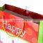 Manufacturer wholesale gloss lamination packaging paper gift bags with handles