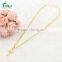 Gold cross necklace