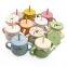 trainer cup and snack catcher mushie snack snack cup holder