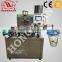 Rotary type plastic cup filling and sealing machine
