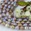 Freshwater loose pearl strand size 15mm grade AA light peacock nulceated pearl strand
