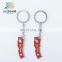 Nepal soft enamel irregular shaped souvenir custom metal keychain supplier