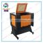 Low Price multi-function Crystal,Wood, MDF, Glass, Crystal, Marble, Stone Laser engraving machine with Rotary device