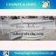 Portable ice rink barrier for synthetic ice rink board