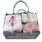 diaper caddy with shoulder belt trim leather pocket edge