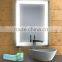 illuminated bathroom mirror with glass shelf