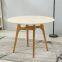 Modern simple white and black round wood dining table for restaurant