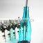 colorful glass candle bottle with hinge handle and buttom tray