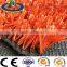 red grass artificial athletic turf for running track