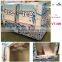 Upright ice merchandiser with fan cooling system