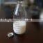 Glass milk bottle with different size and metal lid glass beverage jar with corks