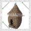 Hanging natural handmade eco-friendly wild bird house nest feeder made by plant leaves