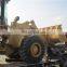 Японский погрузчик на колесах Caterpillar 966H осуществляет погрузку, фронтальный погрузчик CAT 966H отправляется в порт