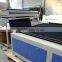 Fabric laser cutter with auto feeder and calibration system