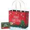 China manufacturer matt lamination christmas gift paper bag with cotton handle,New Design White Handmade Paper Bag pack
