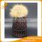 Wholesale woolen knit cap and hat with real raccoon fur pompoms winter hat