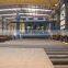 Continuous through conveyor steel surface polishing shot blast abrasive machine