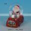 Unique christmas snow globes,resin santa snow globe for wholesale