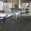 Automatic toilet tissue paper log saw cutting machine