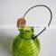 Colored glass bee catcher with handle
