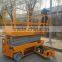 Mobile electric mini self propelled scissor lift table