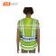 Roadway workers wearing security vest for traffic use