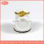 delicate white porcelain thimble set or ceramic hand ring jewelry holder with gold paint line