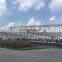Low cost prefabricated wide span industrial  lightweight steel warehouse building sale