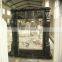 carved black granite fireplace surround,stone fireplace