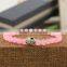 BRA0741 Wholesale Rose quartz beaded alloy metal skull head bracelet
