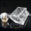 Luxury 100ml clear glass perfume bottle with decorative cap