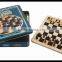 wooden chess set in tin box