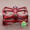 Red color mountain racing bike pedals