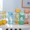 BPA Free clear plastic joyshaker drinking water bottle with handle