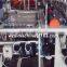 Fully Automatic Control T Shirt Vest Bag Making Machine with Auto Punching