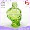 green skull shape glass bottle for perfume