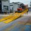 Steel yard ramp for loading and unloading trucks