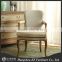 antique upholstered dining chair with armrest