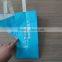 colored shopping kraft paper bag with ribbon handle