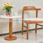 Modern wooden teak color arm chair with fashionble round table