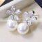 Women 's gold plated flower rhinestone pearl earrings